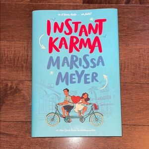Instant Karma by Marissa Meyer Hardcover Book